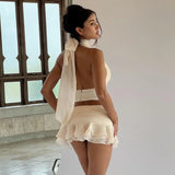 Bomve Deep V Sexy Backless Halter Top Flower Ruffled Skirt Suit Female Sleeelevess 2024 Summer New Club Party Two Pieces Set